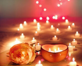 Romantic evening with roses and candles